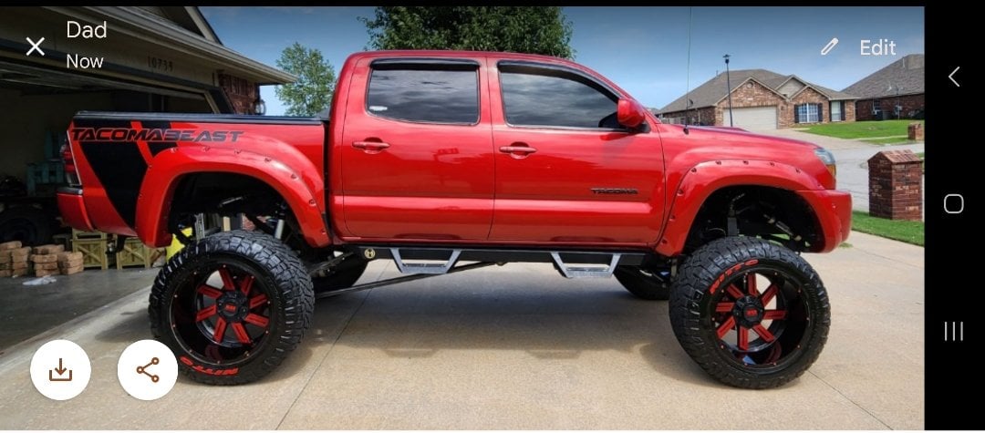 2011 Toyota Tacoma with Xtreme mudder Rims and Nitto Tires